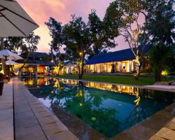 Villa San Pool and Villa at Dusk