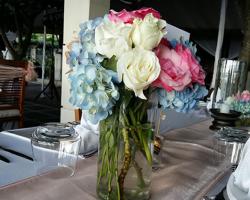 Blue Hydrangea and white rose centerpiece